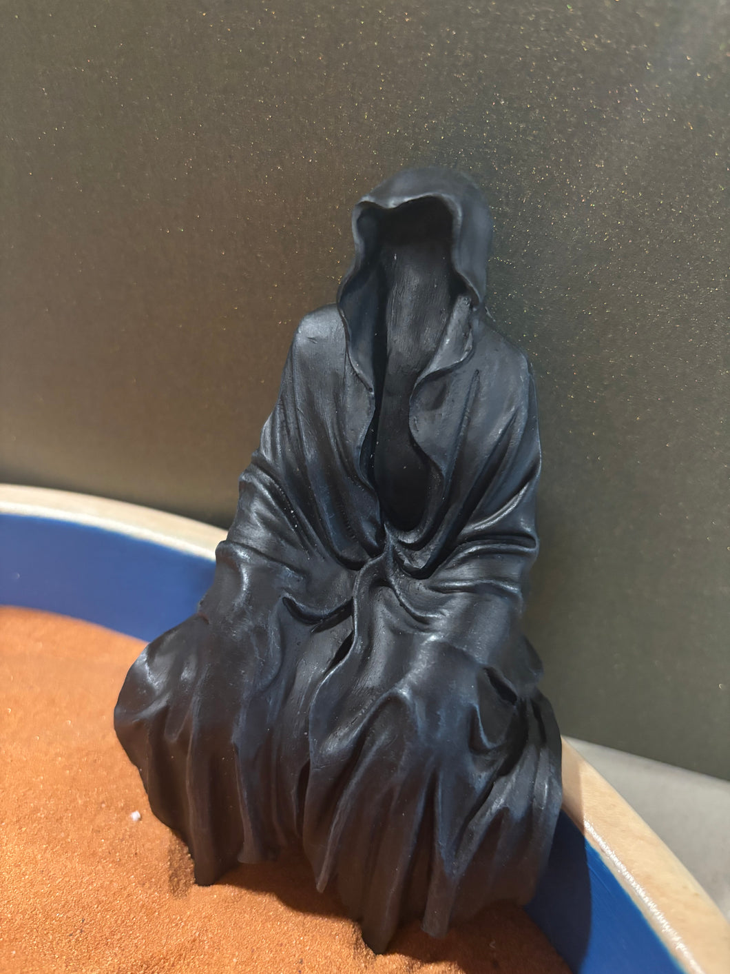 Faceless Shrouded Figure