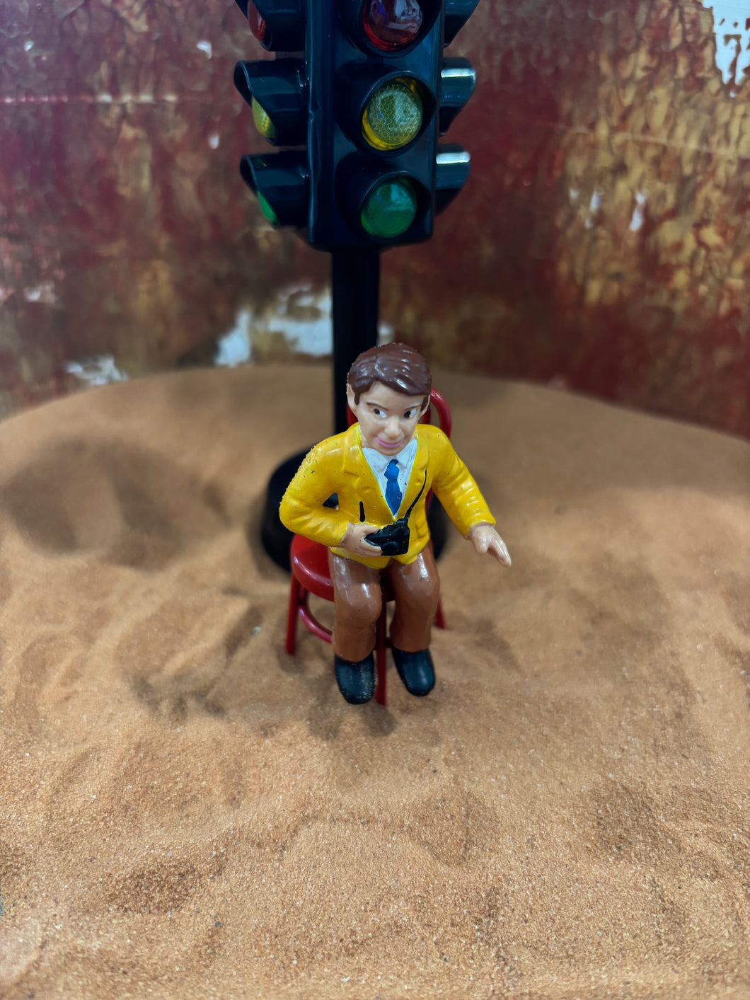 Man with Camera Sitting